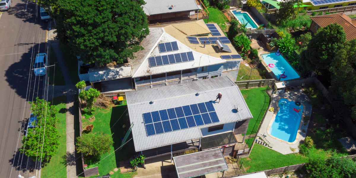 solar panels on top of homes in neighborhood